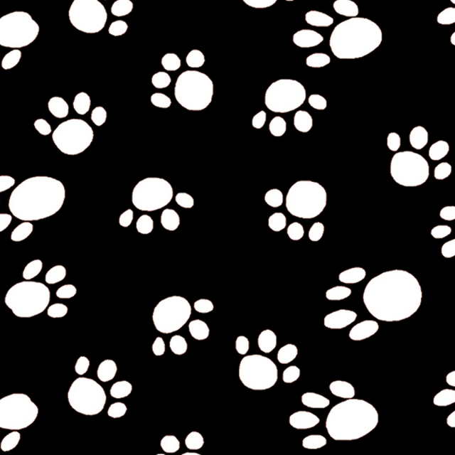 BLACK Dog Paws Allover Fleece Fabric