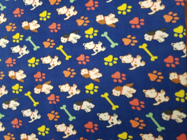 Dogs and Paws Royal Blue Fleece Fabric